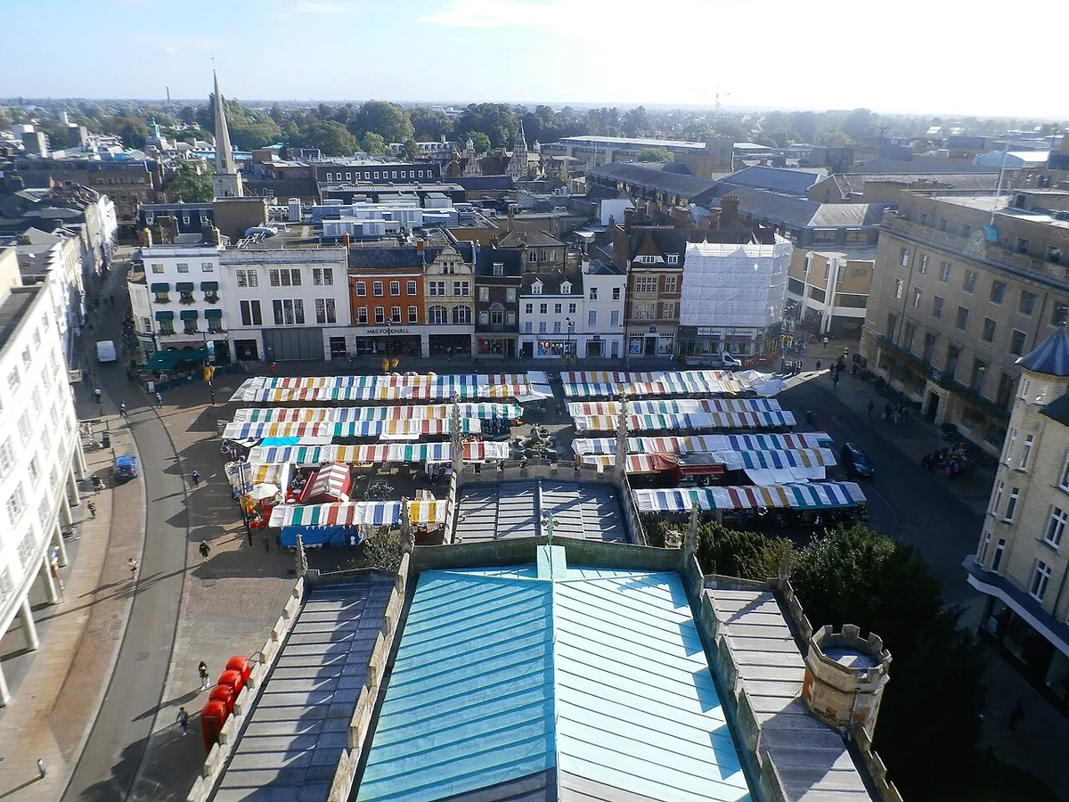 Cambridge Market Square stalls shoppers city centre