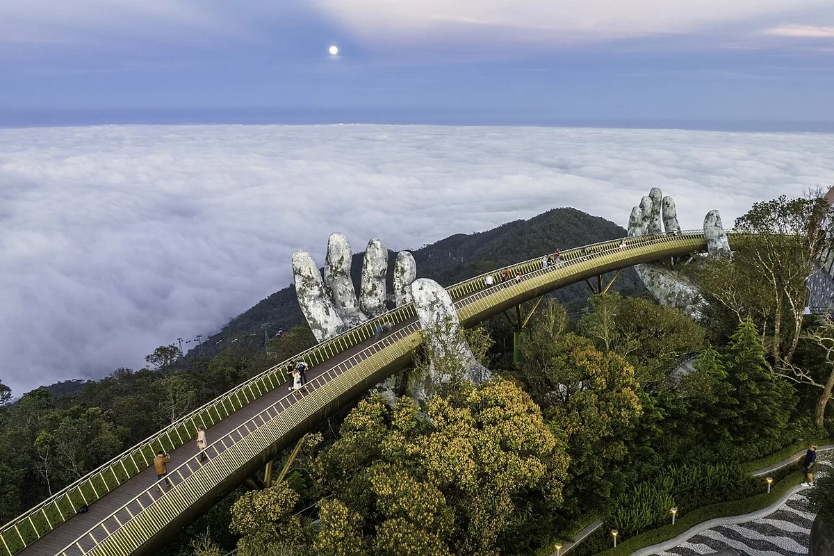 Golden Bridge Ba Na Hills Da Nang Vietnam above clouds top attraction