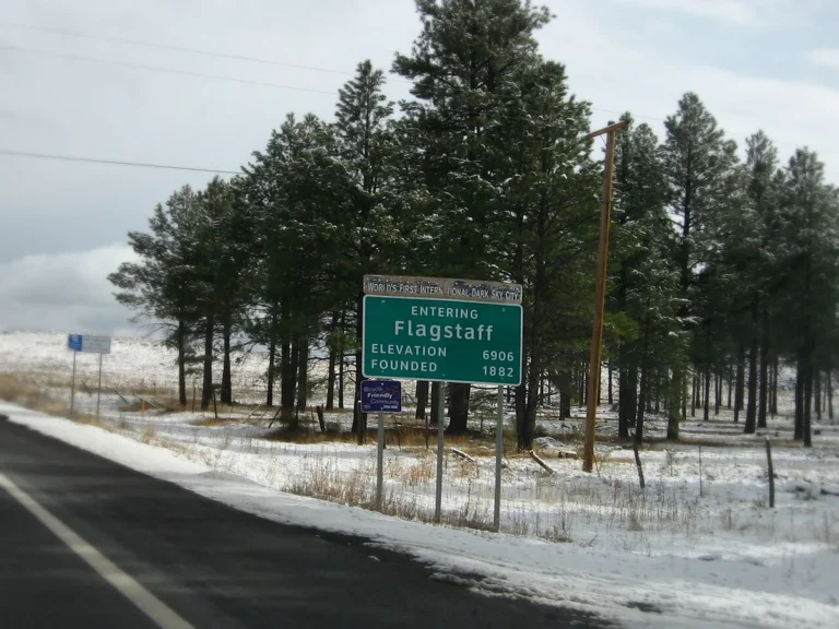 Flagstaff Arizona city welcome sign ponderosa pine Route 66 mountain town