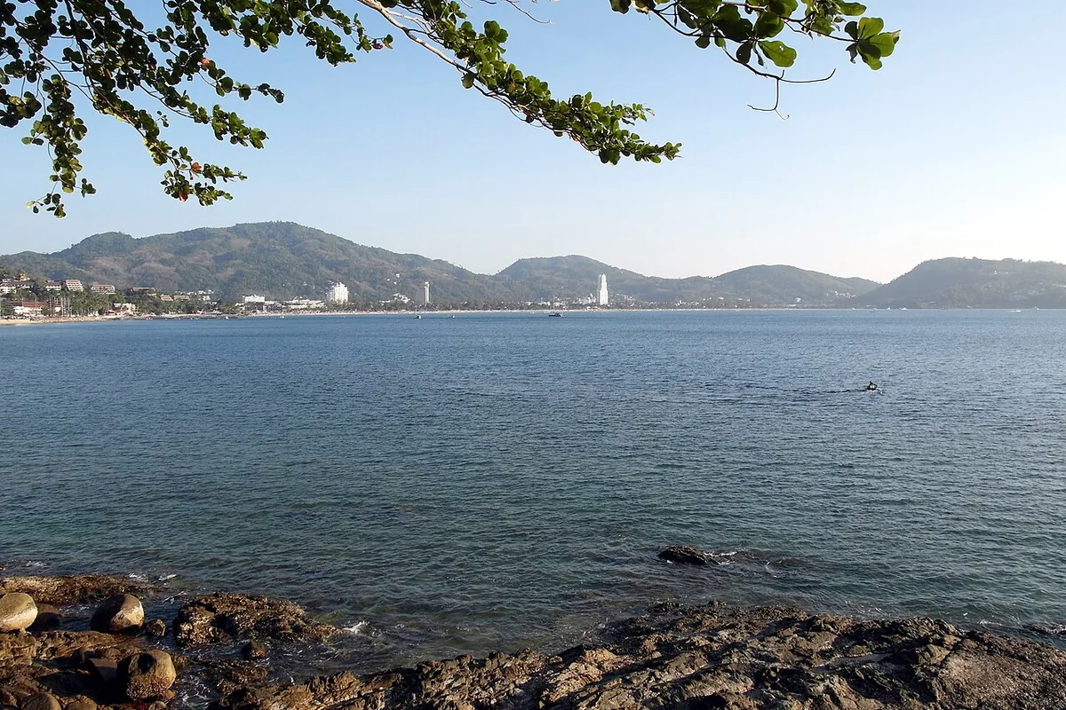 Best Things to Do in Phuket, Thailand (2026 Guide) 4 Patong Beach Phuket Thailand sunbathers turquoise water tropical